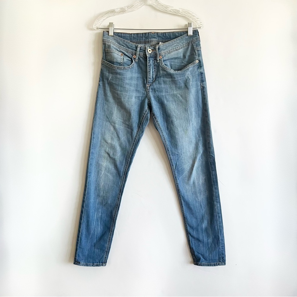 Mid Rise Tapered Distressed Slim Jeans